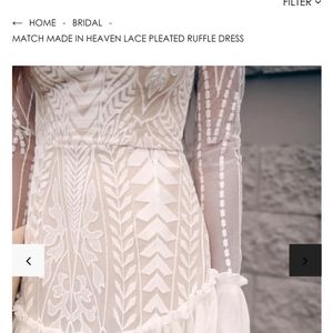 Saints and Secrets white lace mini dress